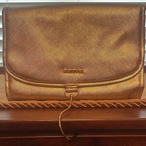 Relabel Metallic Gold Clutch